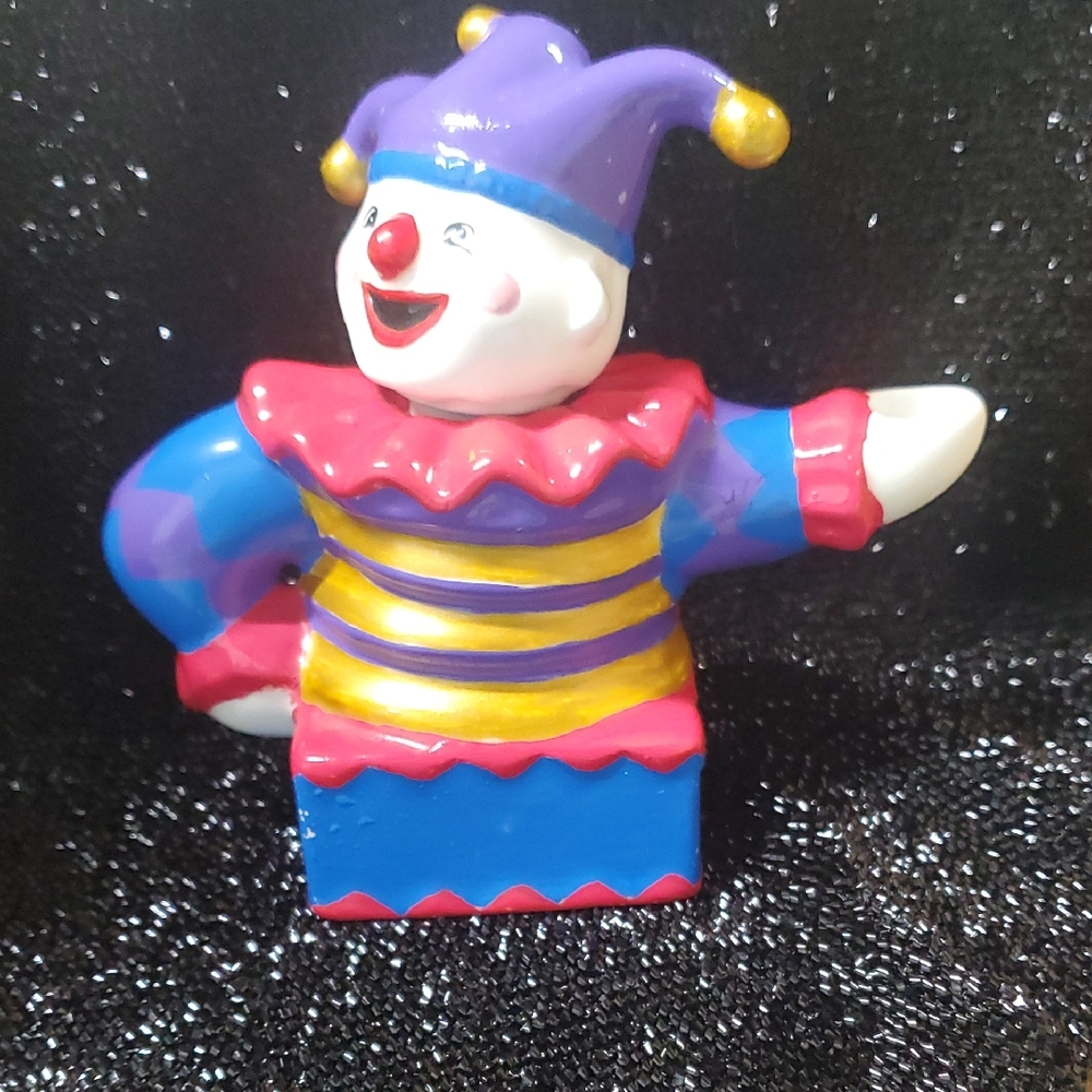 Vibrant Jester Doll with Purple and Red Accents